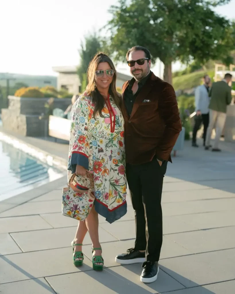 Portrait of Collin Pierson and Michelle Durpetti wearing sunglasses while attending Engage Luxury Business Summit in Nemacolin.