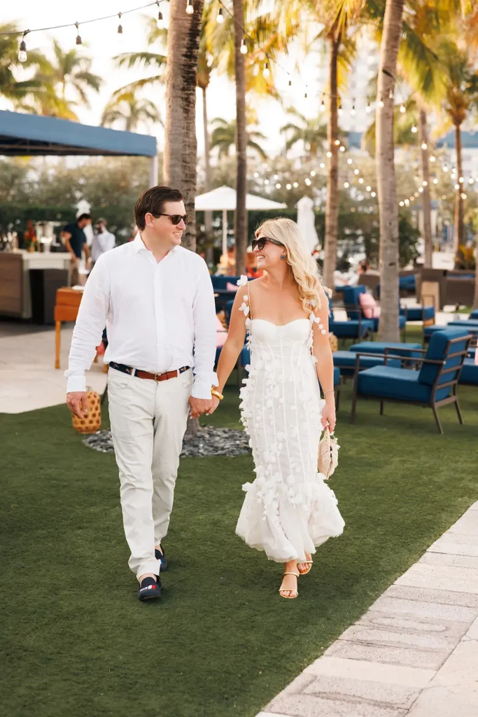 Bride and groom during welcome party for destination wedding in Palm Beach, Florida.